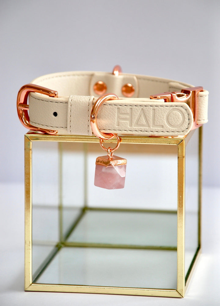 Off white Dog collar with rose quartz crystal, pink dog accessories, designer collar dog.  Rose Quartz helps with bonding, love and connection with your newly adopted dog after dog rescue or dog adoption. Great designer puppy collar off white. Beige dog collar,crystal therapy for dogs, healing crystals for dog collars, calming crystals for dogs, dog collars with healing crystals, calming crystals for dogs