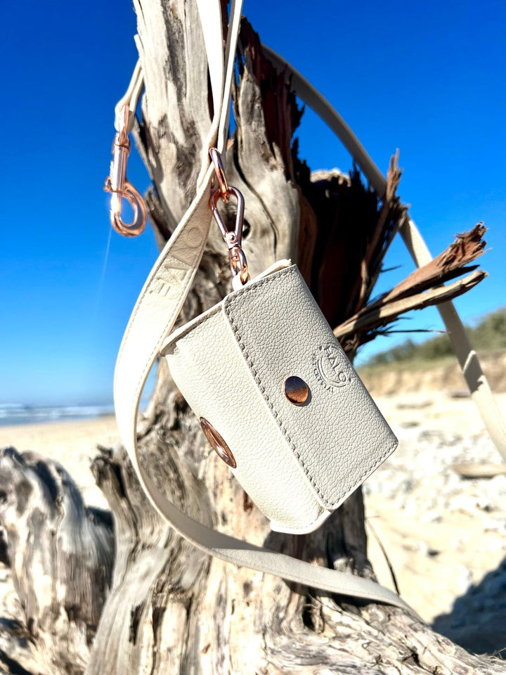 Halo Pet Crystal Royal Beige Off White Leash and Poop Bag Holder at the beach
